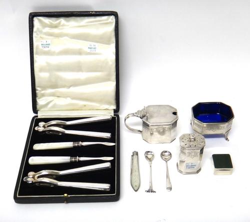 A silver three piece condiment set, comprising; a mustard pot, a salt and a pepperette, each piece of octagonal form, with engraved decoration, Birmin