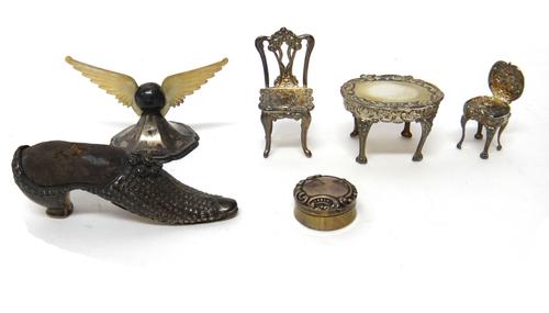 Silver and silver mounted wares, comprising; a Victorian pin cushion, designed as a lady's shoe, Birmingham 1898, miniature furniture, comprising; two