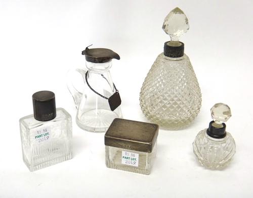 Silver mounted glass wares, comprising; a whisky flagon with label detailed Whisky, a rectangular glass box, the body engraved with floral swags, Lond