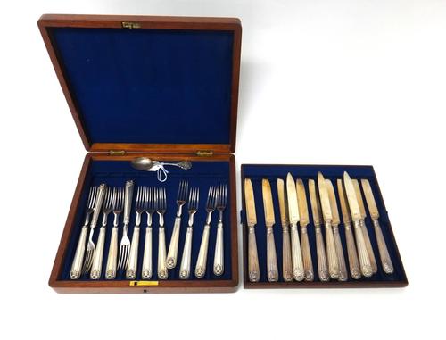 Silver, comprising; twelve silver bladed dessert or fruit knives, with loaded King's pattern silver handles, by Paul Storr, London 1812, twelve desser
