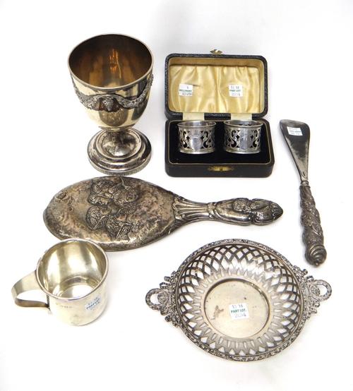 Silver and silver mounted wares, comprising; a twin handled bonbon dish, having pierced decoration, Birmingham 1907, a christening mug, Birmingham 192