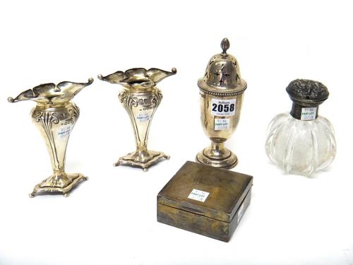 Silver and silver mounted wares, comprising; a sugar caster, London 1911, a pair of vases, of Art Nouveau design, London 1907, a square cigarette box