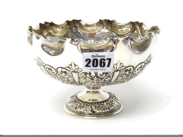 A silver rose bowl, with a shaped circular rim, the body with floral, foliate and scroll embossed decoration, Sheffield 1902, diameter 16cm, weight 26