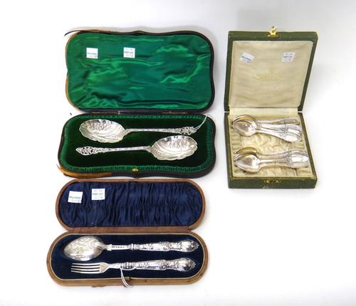 A pair of Victorian silver serving spoons, cast and embossed with floral and scrolling motifs, London 1898, cased, a Victorian silver christening spoo
