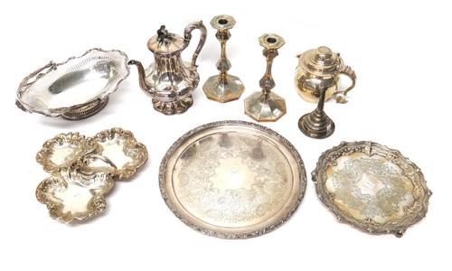 Plated wares, comprising; a circular salver, a smaller shaped circular salver, decorated with a pierced border and raised on three feet, a coffee pot