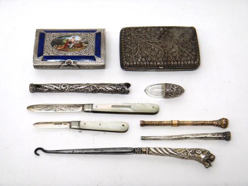 A European enamelled rectangular case, fitted with a mirror within, the exterior enamelled with a courting couple scene, detailed 800, an Eastern rect