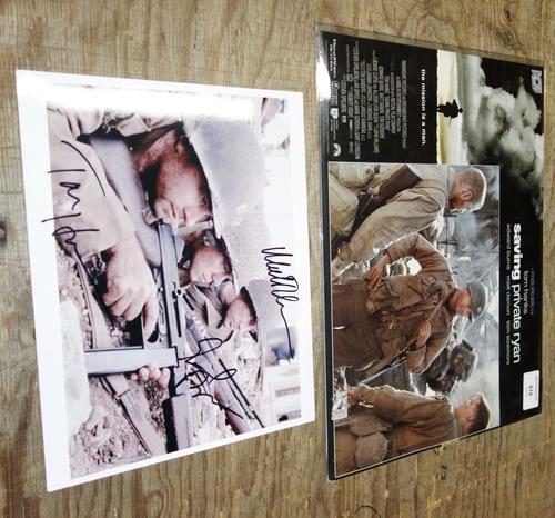 A 'Saving Private Ryan' lobby card and signed photo. All potential purchasers should satisfy themselves with authenticity of signatures. CAB
