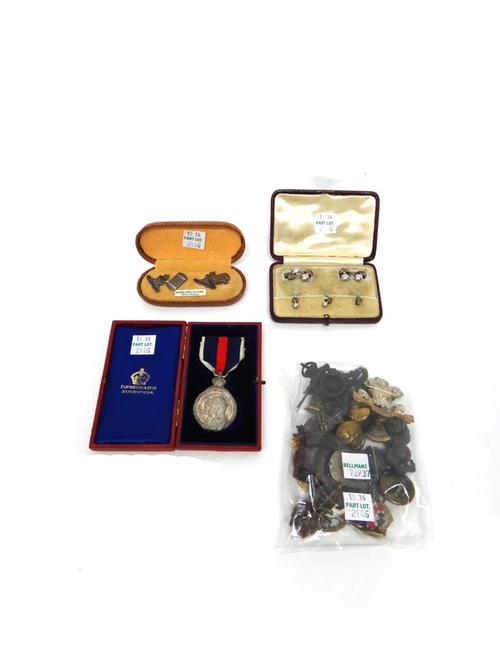 An Edward VII Coronation medal, silver issue 1902, cased, a pair of cufflinks and three studs, decorated with flaming grenades, cased, a pair of silve