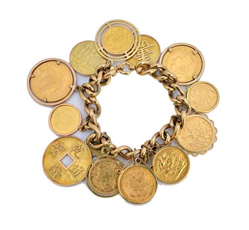 A gold hollow curb link bracelet, fitted with nine British and Foreign gold coins, including a sovereign 1963 and a USA ten dollars 1894 and also with