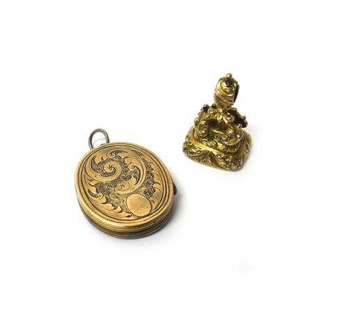 A Victorian gold back and front and bloodstone set oval pendant locket, with feathered scroll engraved decoration, the front applied with a monogram e