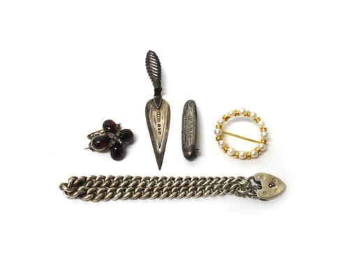 An 18ct gold and cultured pearl brooch, in a circular design, a rose diamond and carbuncle garnet brooch, in a quatrefoil shaped design, fitted with a