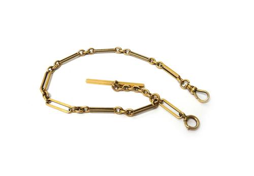 A gold bar and oval link watch Albert chain, fitted with a swivel detailed 14 K, a T bar and a boltring, weight 22.8 gms.