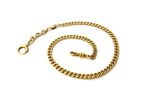 A gold faceted curb link watch Albert chain, fitted with a gold swivel, detailed 14 K and with a boltring, weight 24.5 gms.