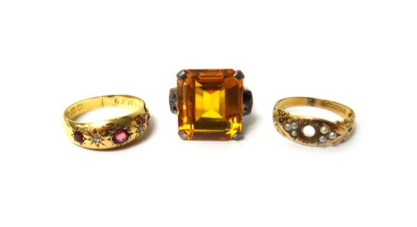 An 18ct gold, ruby and rose diamond set five stone ring, a 9ct gold ring, the centre gemstone lacking, Birmingham 1899 and a synthetic orange corundum