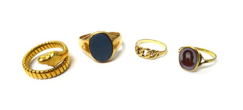 A 9ct gold ring, in a chain link design, a gold and sardonynx set Masonic signet ring, another signet ring and a gold ring, designed as a coiled snake