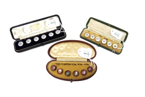 A set of six gold mounted mother of pearl dress buttons, detailed 9 CT, cased, six various mother of pearl dress buttons, cased and a set of six gilt