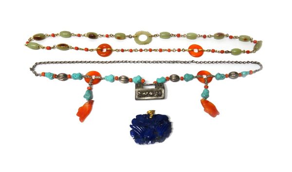 A jade, cornelian and coral necklace, formed as a row of barrel shaped jade links, spaced with coral beads and further fitted with two cornelian disks