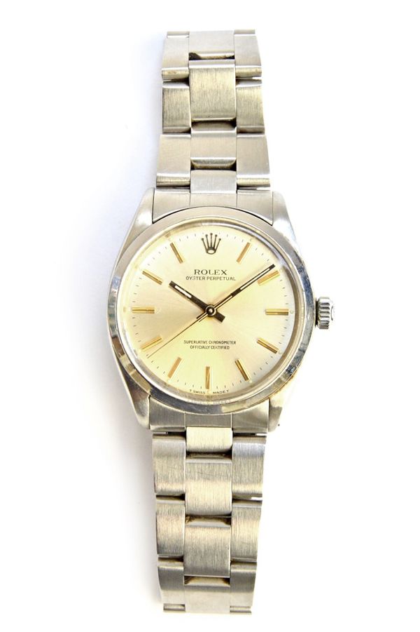 A gentleman's steel Rolex Oyster Perpetual bracelet wristwatch, the signed circular silvered dial, with gilt baton shaped numerals, gilt hands and wit