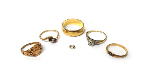 A gold plain wedding band ring, detailed 14 K, a gold ring mounted with one small diamond, (two further gemstones lacking), a gold ring, mounted with