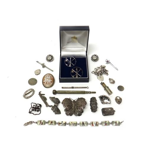 An enamelled bracelet, formed as a row of curved rectangular panels decorated with ancient Egyptian scenes, eleven brooches and pins including two 'Ho