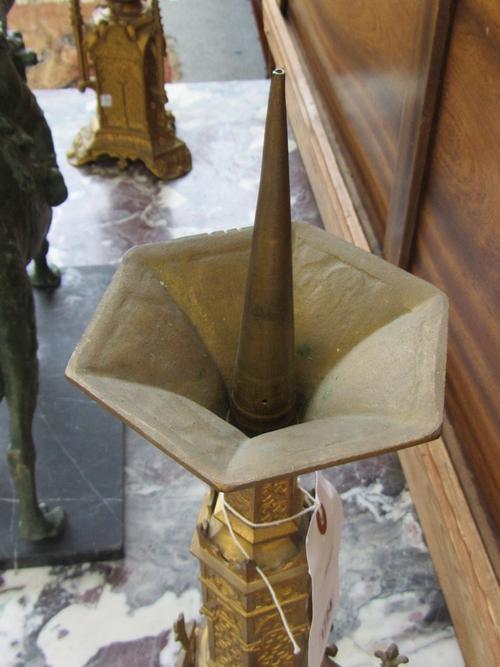 A gold, uniform curb link watch Albert chain, fitted with a gold T bar, detailed 14 CT and with a gold swivel, detailed 18, weight 23.6 gms.