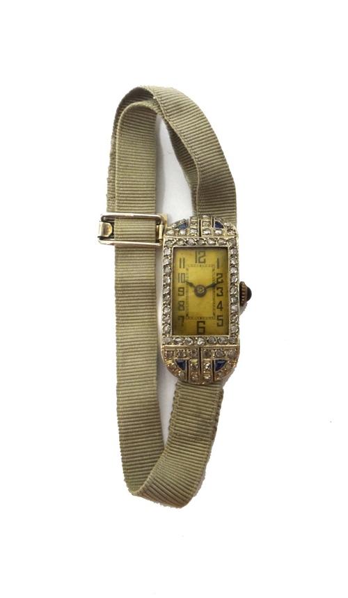 A lady's French white gold cased, rose diamond and synthetic sapphire set rectangular cased dress wristwatch, with an unsigned jewelled movement, the