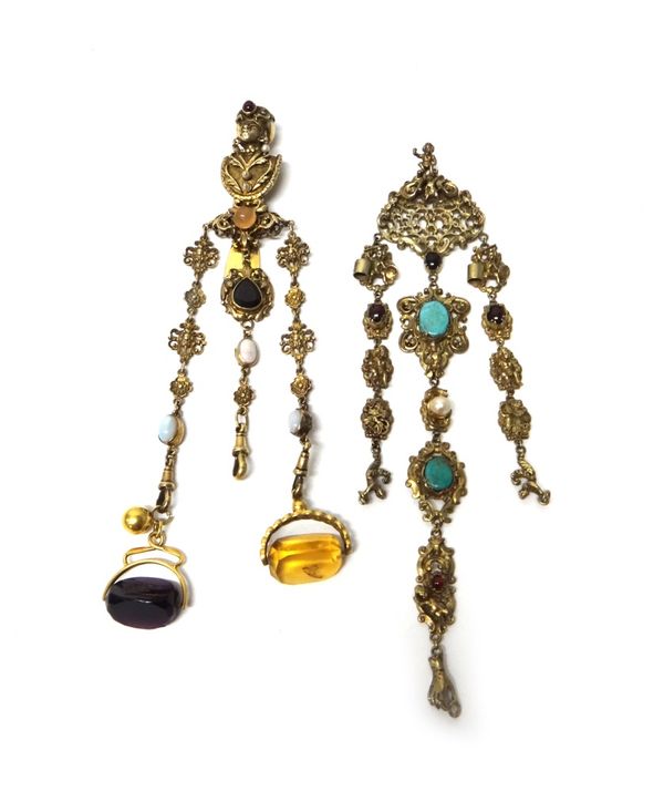 A European gilt composite chatelaine, the clip formed as a turbaned blackamoor with cultured pearl ear pendants, fitted to three chains, mounted with