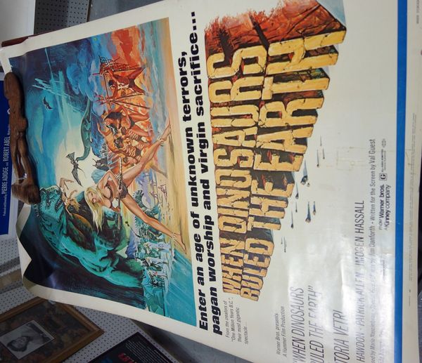A film poster of 'When Dinosaurs Ruled The Earth'.  GA