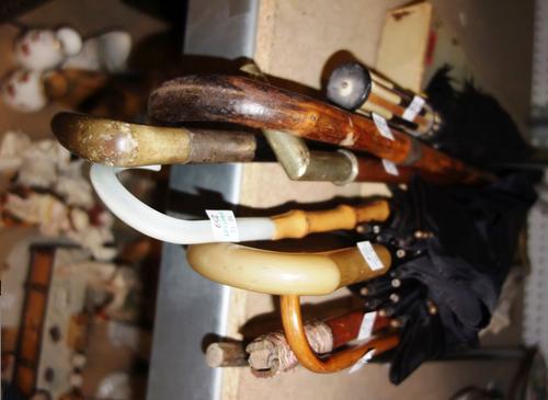 A group of 19th century and later walking sticks and parasols, (qty). S3T