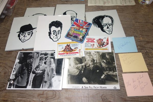 A quantity of 'Carry On' memorabilia including, signed album pages, and caricatures, a Phil Silver's magazine, (qty).All potential purchasers should s