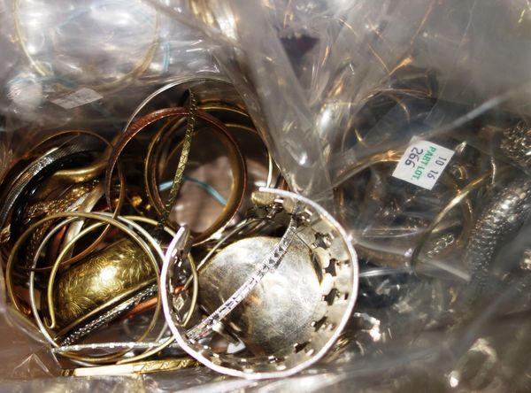 A quantity of costume jewellery mainly bangles, (qty). CAB