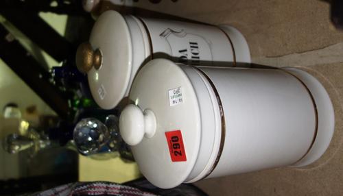 A group of 20th century ceramic and glass chemist's bottles and a group of decanters, (qty).S3B