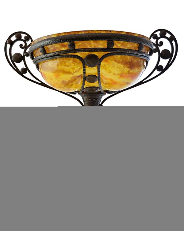 An iron, steel and brass fire basket.  DISPLAY