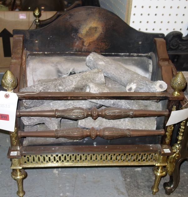 An iron steel and brass fire basket.  DISPLAY