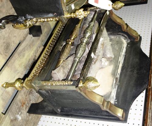 A steel iron and brass fire basket with acorn finials. DISPLAY