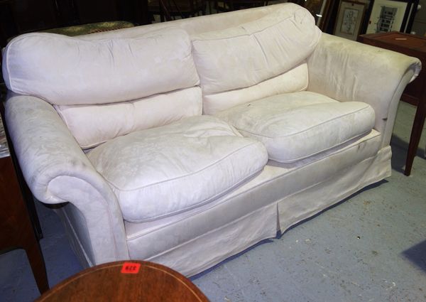 A 20th century cream upholstered three seat sofa, 183cm wide.  E2