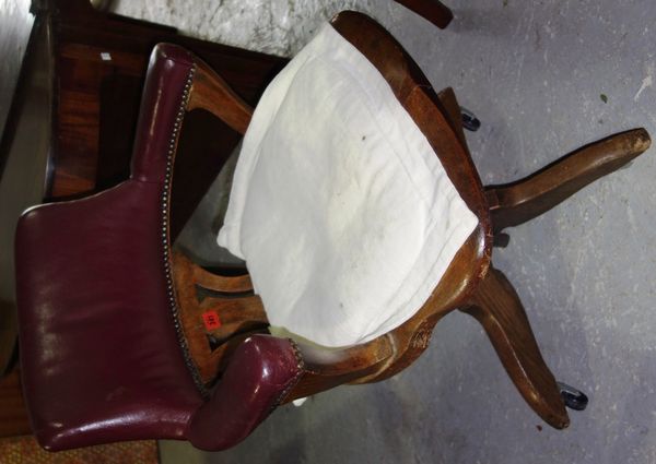 A 19th century oak office swivel chair.  C6