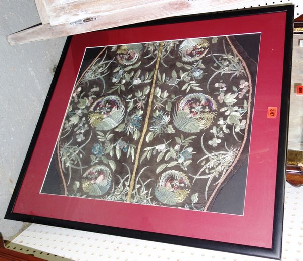 A framed and glazed embroidered Oriental panel.  A1