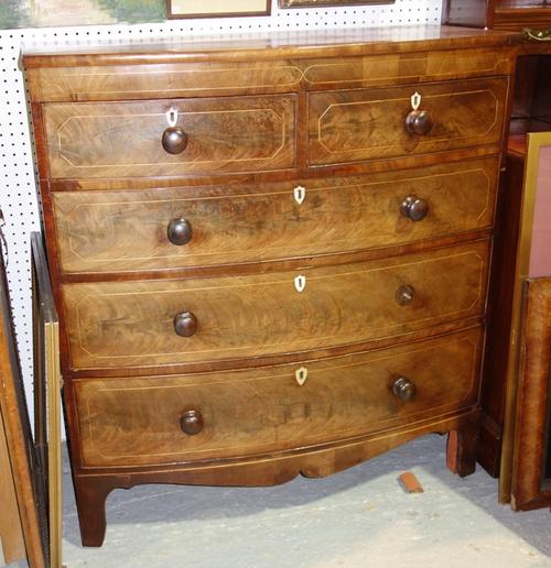A 19th century mahogany bowfront chest of two short and three long drawers, 103cm wide.  E1