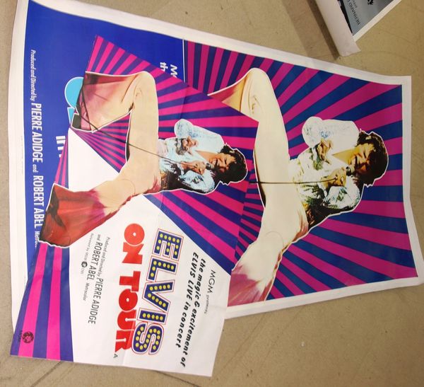 Two Elvis Presley posters; 'Elvis on Tour', one linen backed, (2). GA