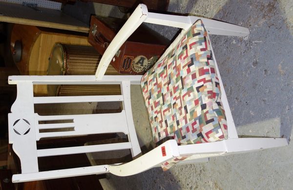 A 20th century white painted armchair.   J5