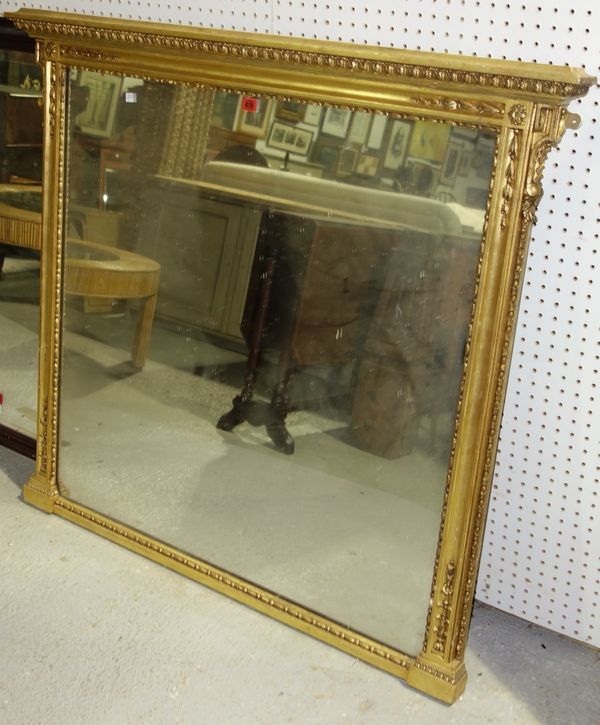 A gilt framed overmantel mirror.  A6