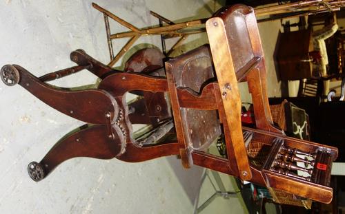 A child's metamorphic high chair.  DIS