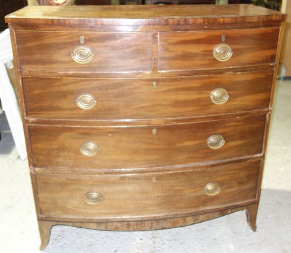 A 20th century bowfront chest of two short and three long drawers, 105cm wide.   DIS