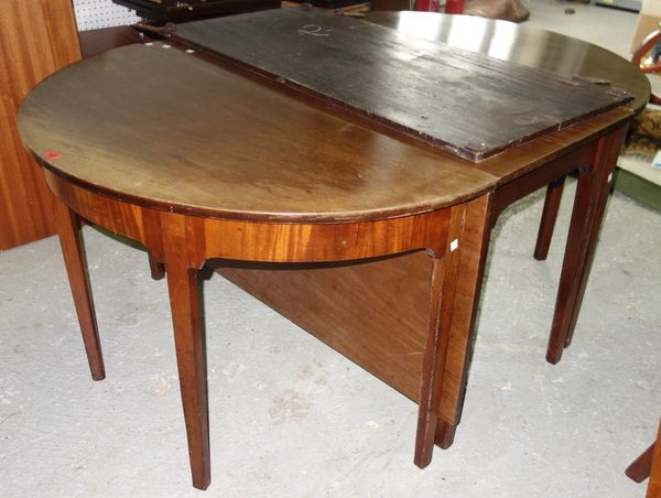 A 19th century mahogany dining table with pair of D ends and drop flap centre section, 114cm wide (3).  B6