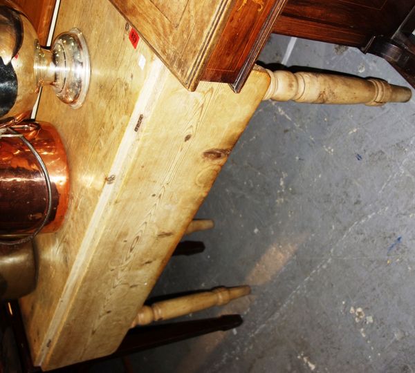 A 20th century pine drop flap table, 100cm wide. DIS