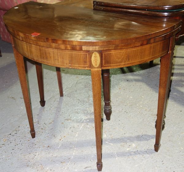 A George III inlaid mahogany card table on tapering square supports, 91cm wide.   H5