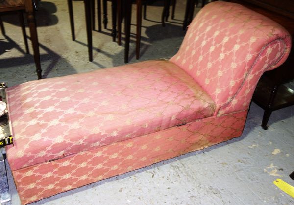 A pink lift top chaise longue.  I6