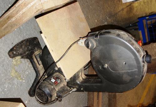 A table top band saw.  EXTRA