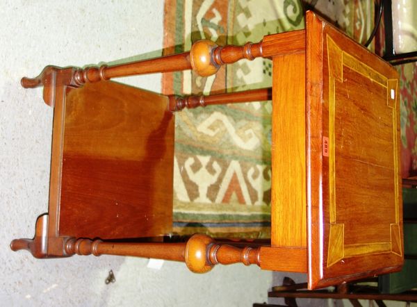 A mahogany and inlaid two tier occasional table.   L6